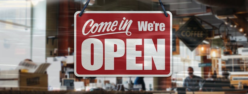 'Open' sign on store window