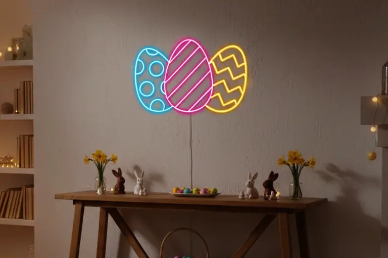 Colorful Easter egg neon sign mounted on a wall with table decorations and bunny figurines.